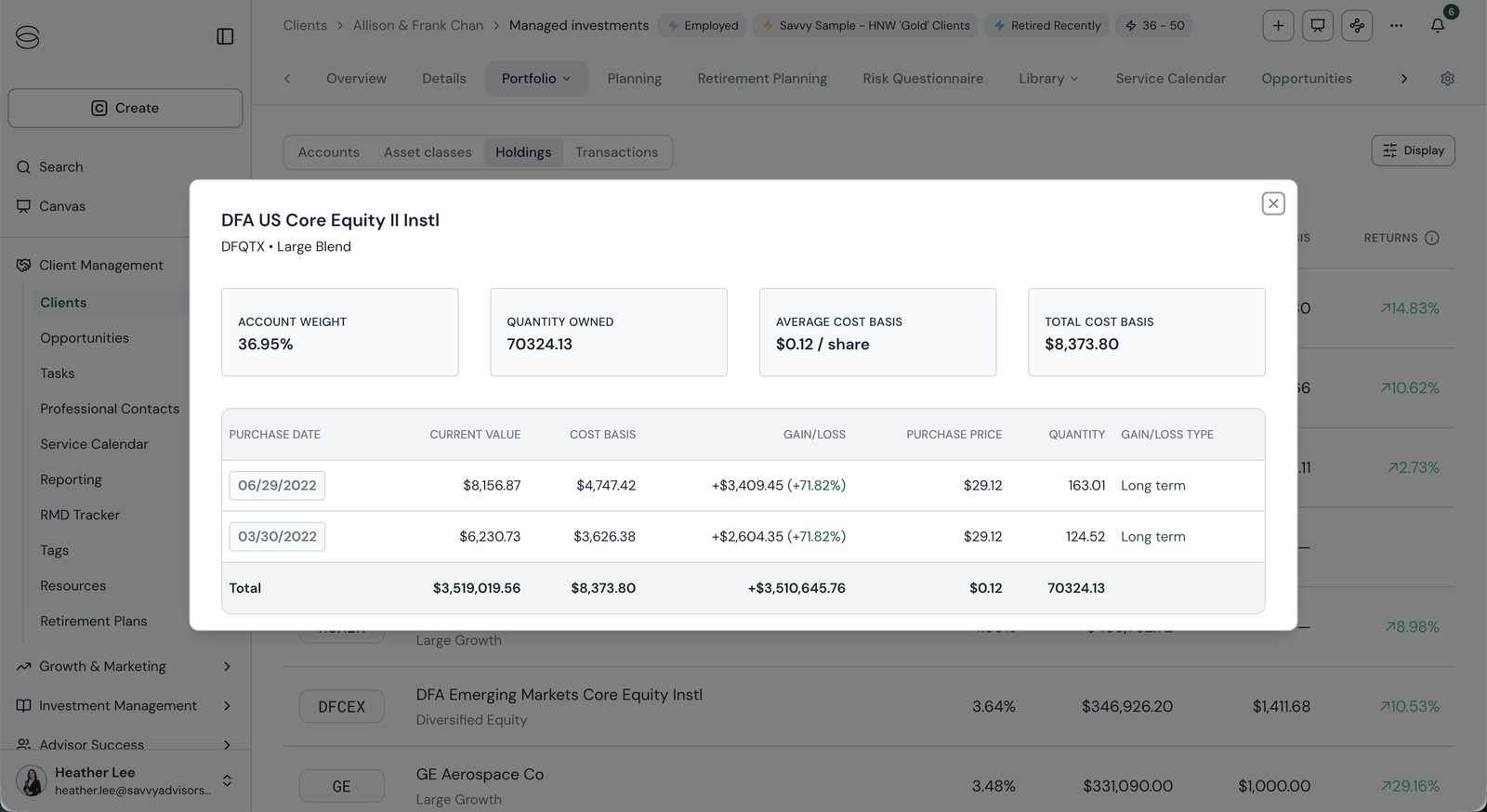 A holdings detail modal for DFA US Core Equity II, showing account weight, quantity, cost basis and two tax lots, with no action buttons